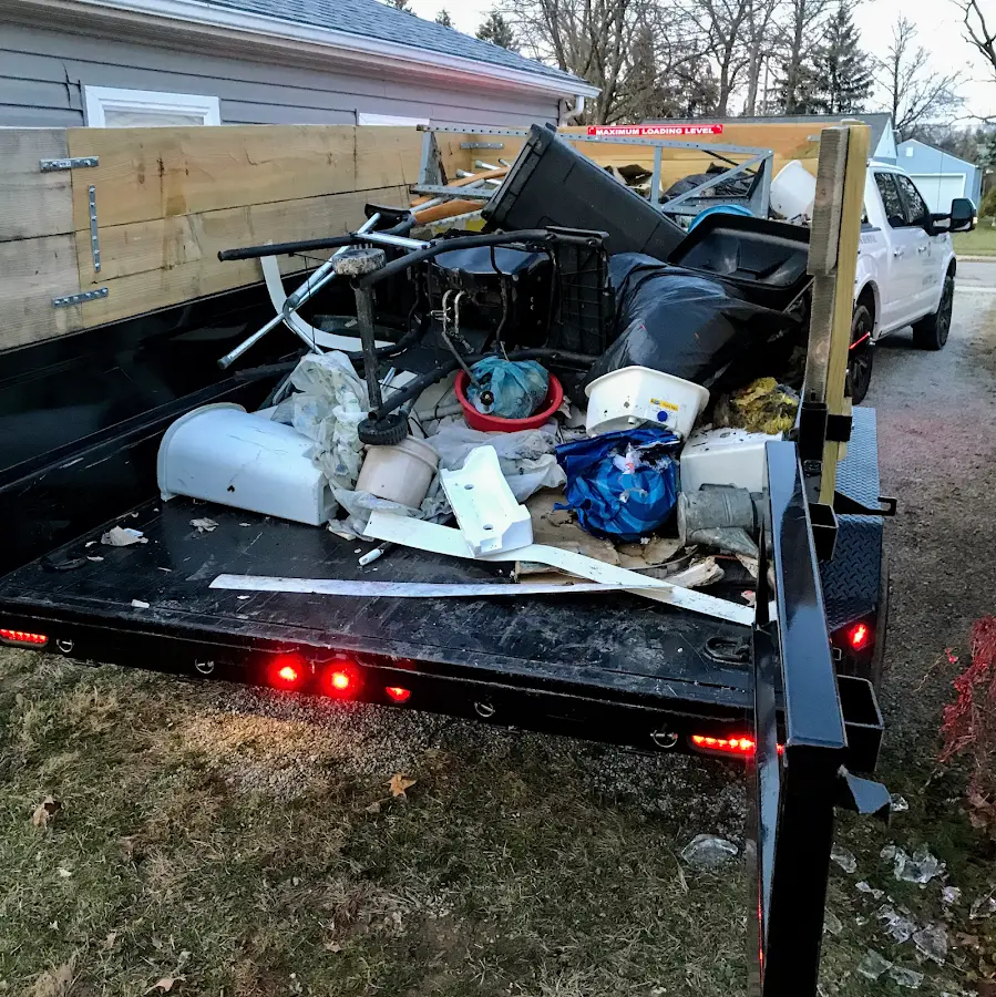 Roll-off dumpster delivered to a residential driveway in Lake Ridge